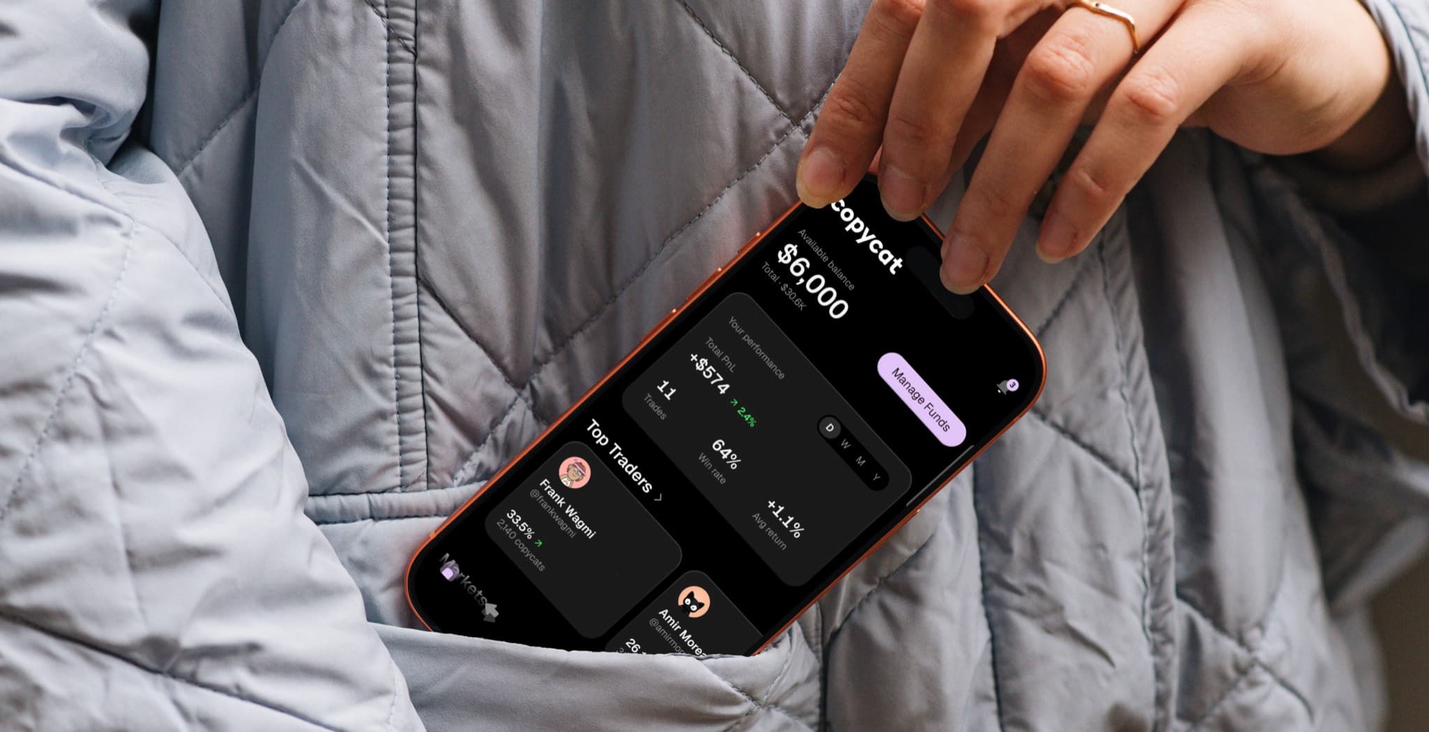A phone showing the Copycat app, tucked into a jacket pocket